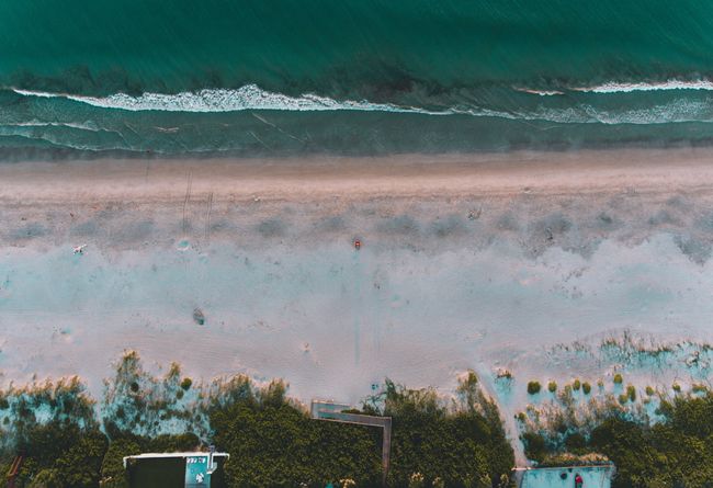 drone view of a beach during low tide